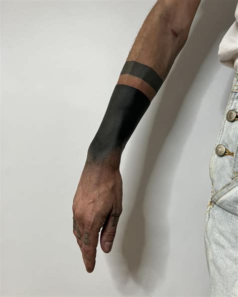 blackout arm tattoo meaning